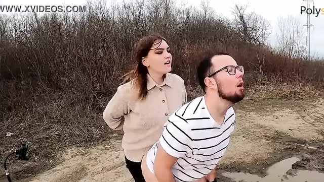 Femdom outdoors with a glasses man